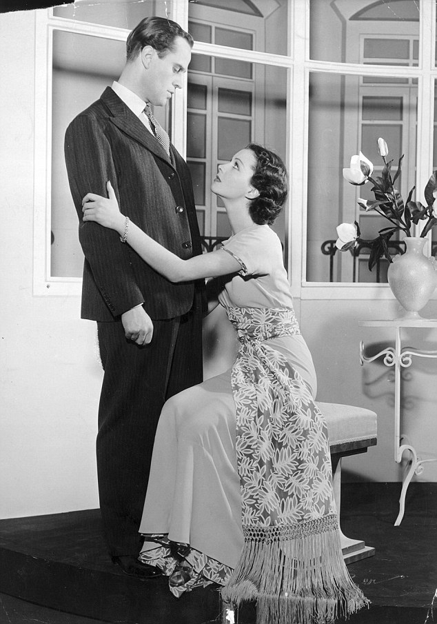 On the night before Olivier's marriage to Esmond, Denys Blakelock (left), who was to be his best man, climbed into Olivier's bed, pictured with Vivien Leigh