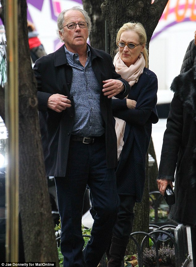 She arrived with her husband Don Grummer for the service on Saturday afternoon