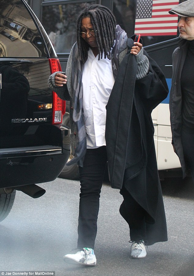 She said 'it's hard' as she hugged Weeds star Mary Louise Parker as she left the service