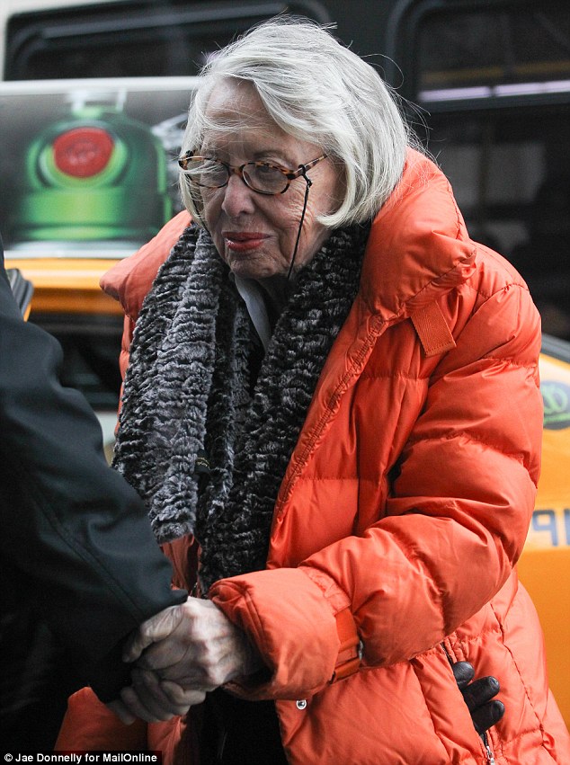 Journalist and columnist Liz Smith spent more than an hour inside the apartment. Asked how Diane Sawyer was coping, she said: 'She is good'