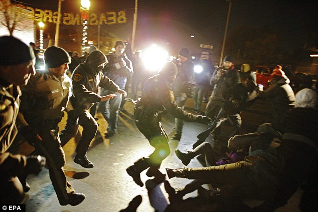 Clashes: President Obama appealed for calm in the city where hundreds have been arrested since August