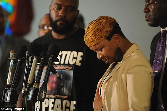 Emotions running high: Brown's parents (pictured) have called for Officer Wilson to be indicted