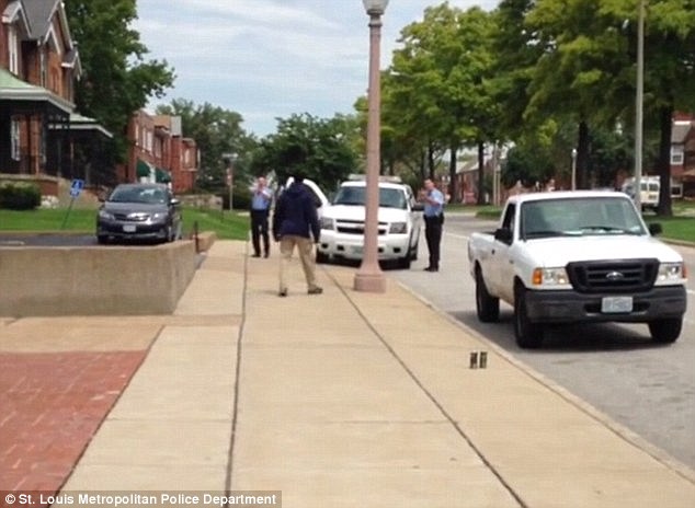 Incriminating footage? This is the moment Kajieme Powell was shot dead by unnamed officers