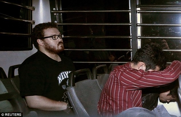 British banker Rurik Jutting (pictured in the back of a prison bus arriving at court) has been declared mentally fit to stand trial over the murders of two prostitutes whose mutliated bodies were found at his Hong Kong flat