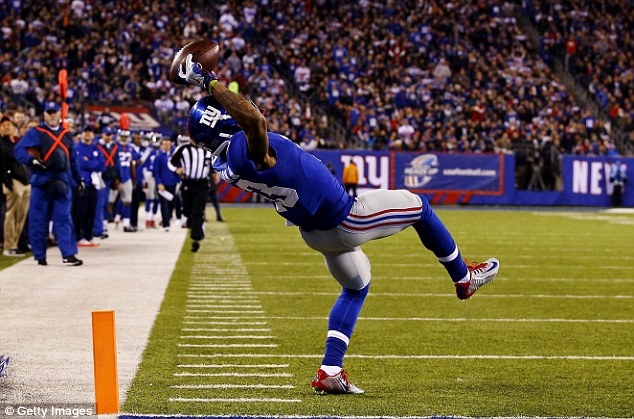 'Impossible!': Even after catching the ball, Beckham kept his weight forward and stepped twice before falling