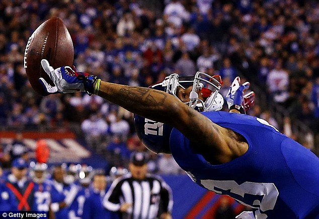 Unbelievable: Odell Beckham Jr caught the ball with just a thumb and two fingers while falling backwards