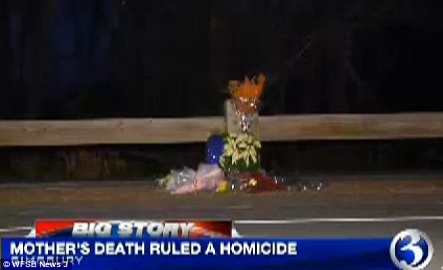 A memorial of candles and dozens of bouquets of flowers sat in the spot where Melissa Millan, 54, the mother of two and a senior vice president at MassMutual Financial Group, was killed at about 8 p.m., Thursday when she was running