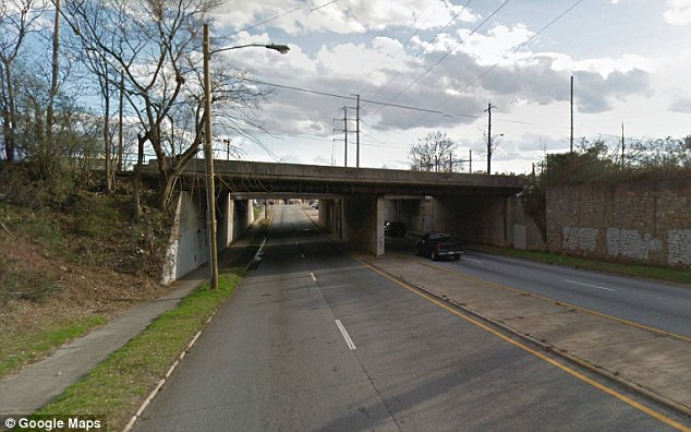 Bridge: Mims was found dead on a sidewalk under a railroad bridge (above) on Northside Drive in atlanta