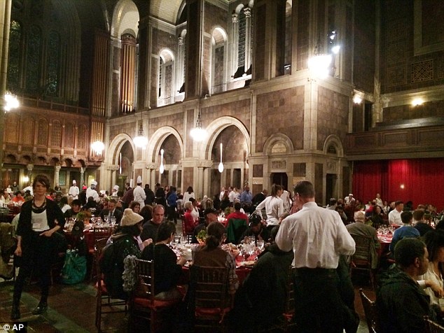 Good cause: About 500 people packed into St. Bartholomewís Church in New York on Friday for a mixer dinner of Manhattan people and the homeless