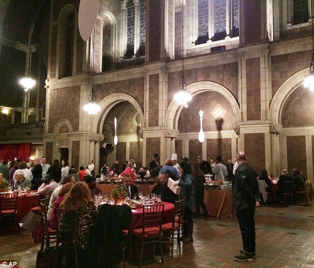 Scene: Wealthier New Yorkers paid $100 a plate to sit with some of their less fortunate neighbors to a dinner, which included roasted turkey, buttered mashed potatoes, red velvet cake and pumpkin cheesecake