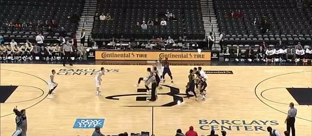 Referee Rick Crawford was stretchered off the court shortly after he was inadvertently struck in the face by LaSalle's Steve Dack following the opening tipoff of the consolation game of the Barclays Center Classic Saturday night