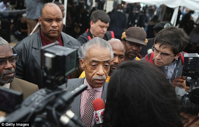 Speech: Civil rights activist Sharpton spoke at a church in Ferguson today in support of the protests