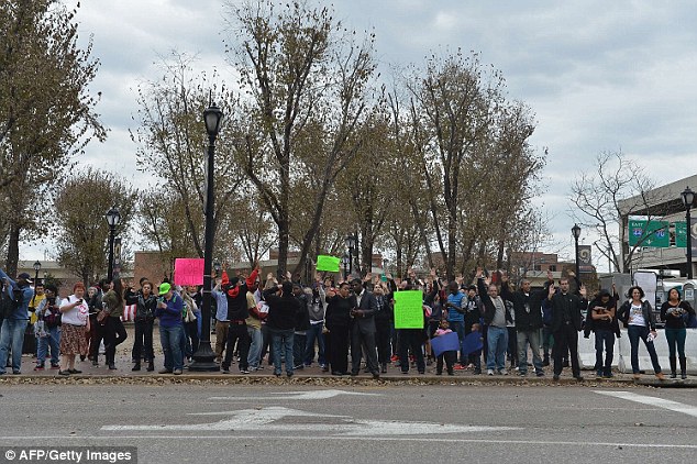 Frustrations: Demonstrators protest outside the Edward Jones Dome in downtown St. Louis, Missouri on November 30, 2014