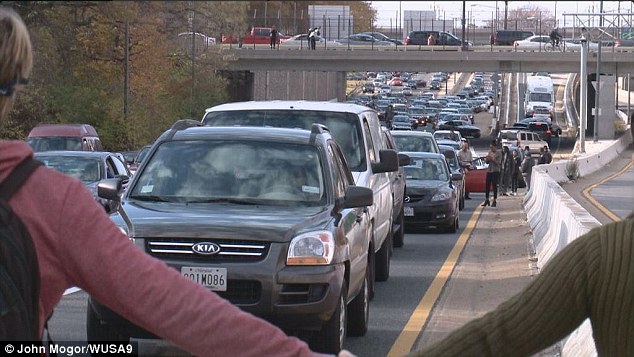 Blockade: Protesters in Washington, D.C., held up traffic on the I-395 for around 40 minutes