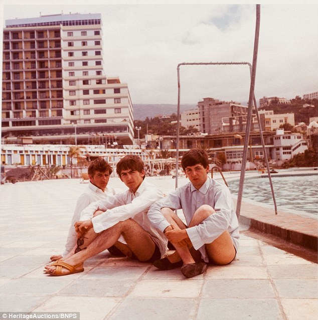 Posing up: Rare pictures showing Paul, George and Ringo from the Beatles on holiday in Tenerife before the band became world famous are to be sold in the U.S. on Friday