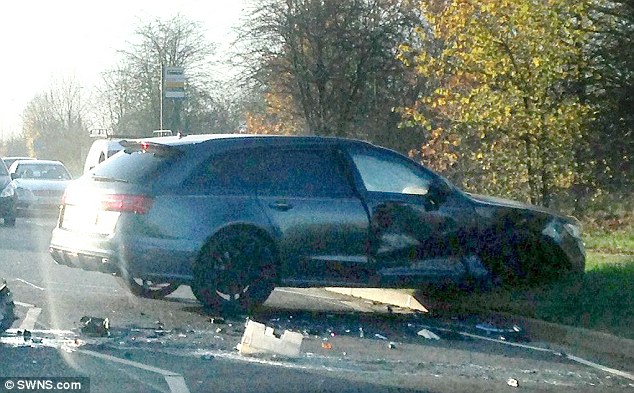 The photos show the driver's side of the former England captain's Audi RS6 was badly dented in the collision