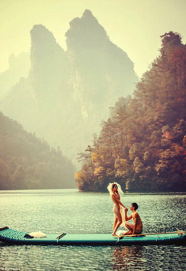 Scenic setting: Hsin Han and Cai Yuan stripped off for their wedding pictures in the Wulingyuan Scenic Area in China's Hunan Province