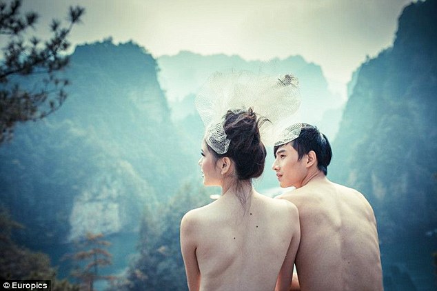 The groom said they posed naked because, 'we wanted to show our love for each other and to have something forever capturing us in the bloom of youth'