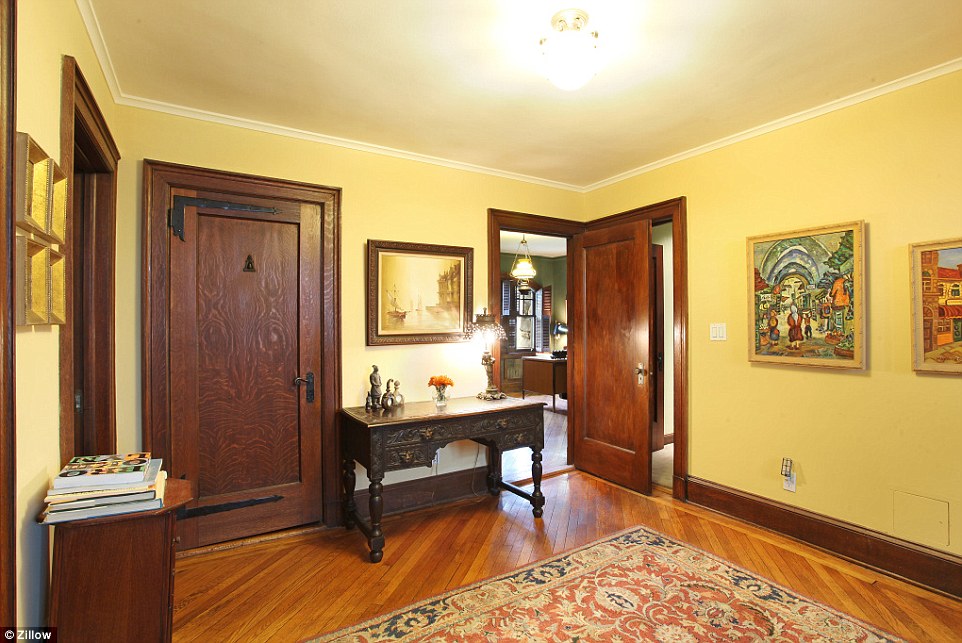Fine touches: The doors are fitted with cast-iron doorknobs, and there are hardwood floors all throughout the house