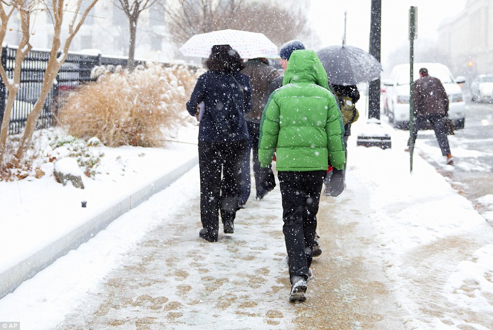 New congress: Pedestrians trudge toward the Capitol as the newly GOP-controlled congress was sworn in Tuesday