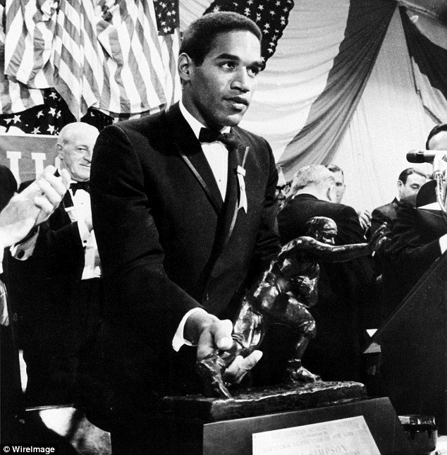 O.J. Simpson, then a running back for the USC Trojans, accepts the Heisman Trophy on December 5, 1968. He would sell this trophy years later, but a replica, which stayed at USC, was stolen in 1994