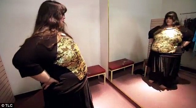 Retail therapy: By month nine, she has lost a total of 145lbs, and is able to go clothes shopping for the first time in years (pictured)