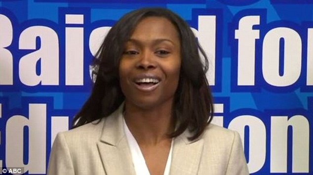 Dazzling: Marie Holmes, looked to have treated herself to a millionaire makeover as she collected her share of the vast lottery jackpot