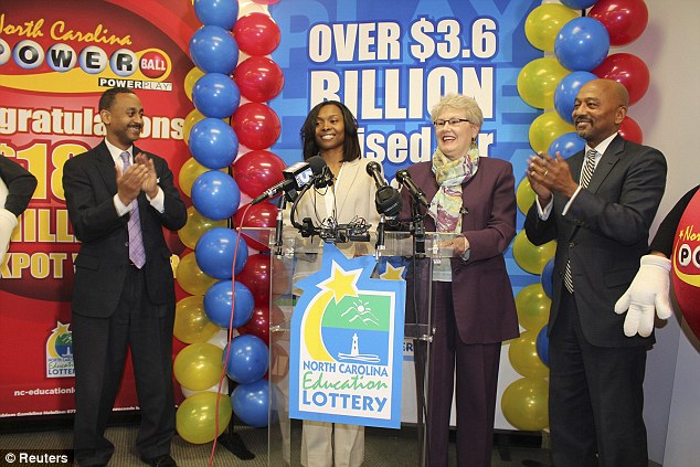 Marie Holmes, 26, from Shallotte, North Carolina, made her $127million lottery winnings official on Monday with a press conference for the Education Lottery