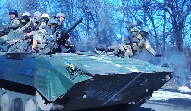 Don't stand up: The footage shows the soldier trying to stand to his position, and then losing his balance