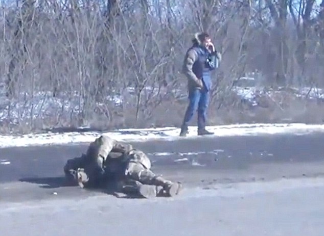 Unconscious: Witness Malik Kundra said: 'We all ran over but the soldier didn't get up. He was taken away and I don't know what happened to him after that, as we weren't given any other information'