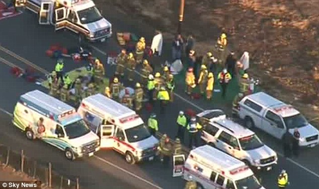 Footage from a news helicopter showed firefighters treating numerous people at the scene in California