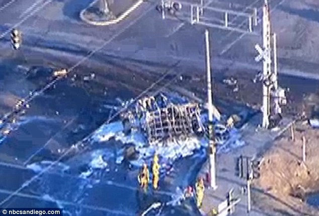 Firefighters raced to the scene shortly before 6am on Tuesday after a commuter train hit a tractor-trailer