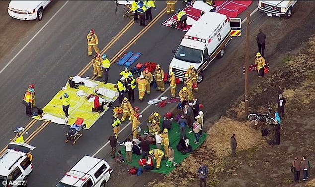 Some commuters from the derailed train were treated at the scene in California following the early hours collision with a tractor-trailer