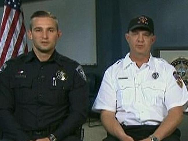 Heard cries for help ... Spanish Fork Police Officer Tyler Beddoes, left, and Spanish For
