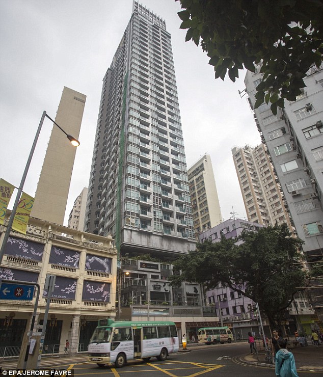 Macabre: Police called to Jutting's flat in J's Residence, pictured, discovered the two dead prostitutes inside