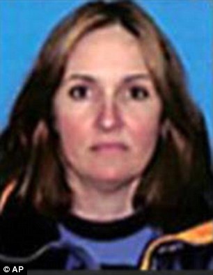 Back in the USA: Kelley turned herself in Monday in Lancaster, New Hampshire, and was arrested