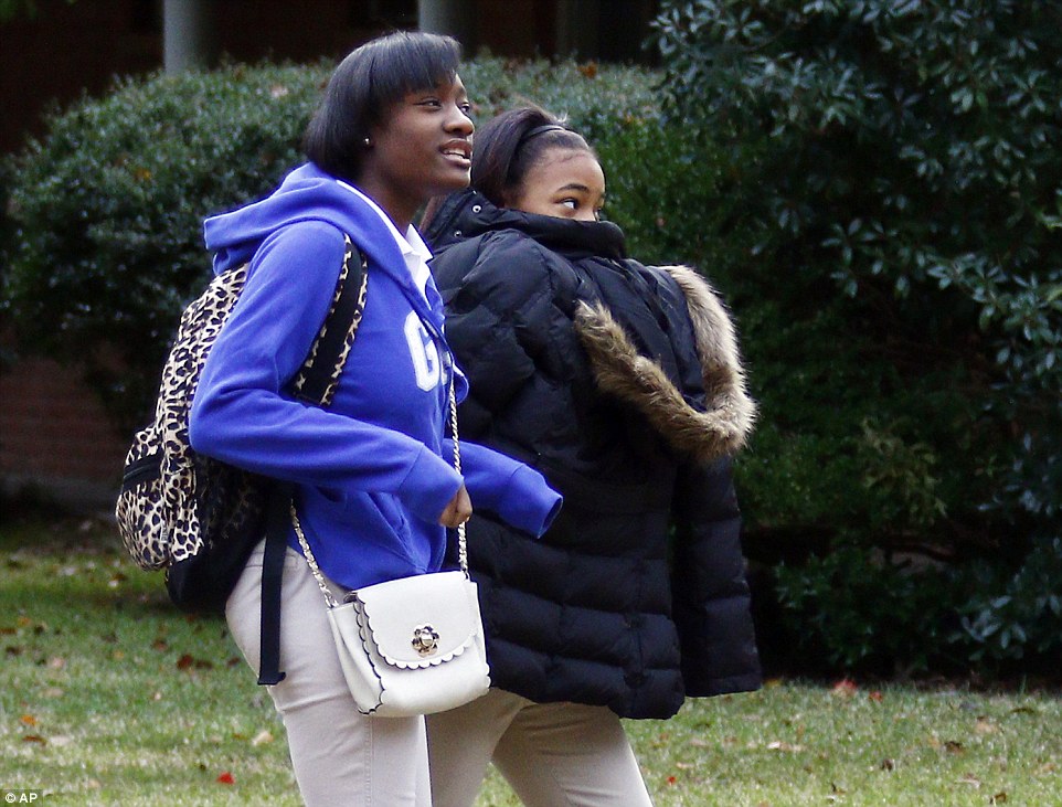 Even cold down south: Two students in Jackson, Mississippi, bundled up on their way to school after temperatures hit 27 degrees. A low of 24 is expected tonight