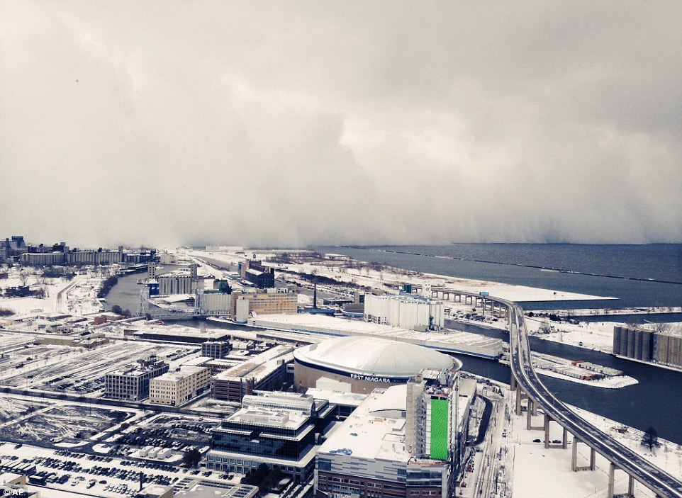 Covered: Lake effect snow hammered Buffalo, New York, and the surrounding suburbs - dumping up to five feet between Monday night and Tuesday