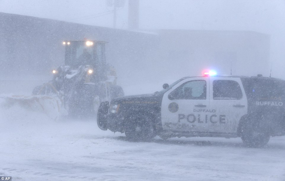 Help: Emergency services were out in force as they attempted to save drivers and passengers who were stranded for as long as 24 hours by the bad weather