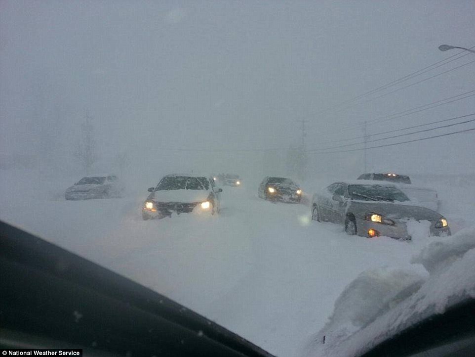 Stranded and killed: Four people died in enormous snowstorms in upstate New York today, while 150 vehicles also had to be rescued