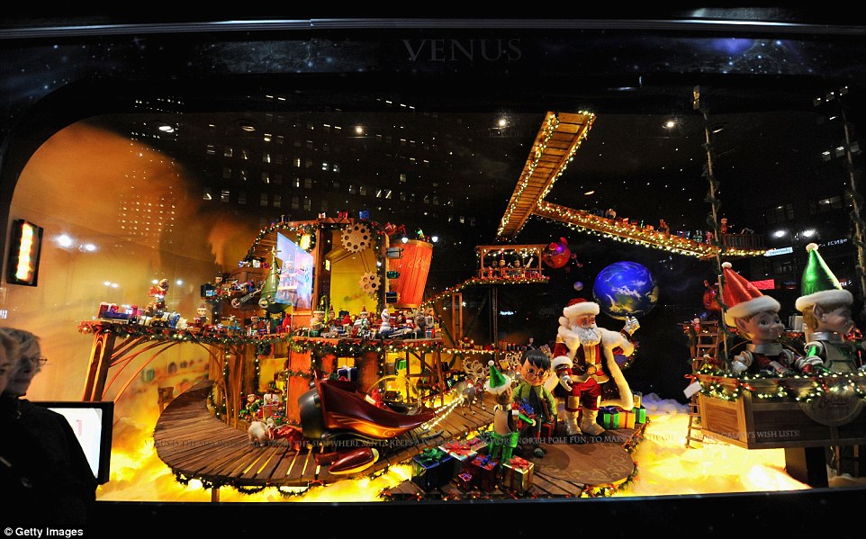 Santa Claus in space as he ride a souped-up sleigh for intergalactic holiday visits. Uranus and Neptune, the coldest planets, have full-time resident ice giants. Jupiter and Saturn have a space elf and space Santa wearing oxygen bubbles, with the many mooned planet and red gaseous planet in the background