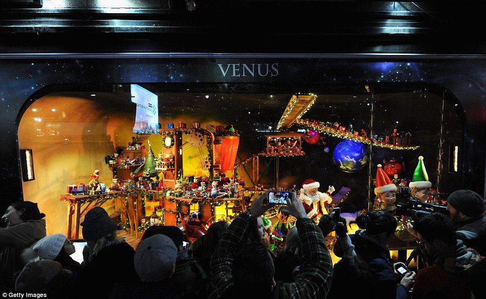 At sunset, the windows were revealed with help from the cast of Broadway’s “You Can’t Take It With You.”