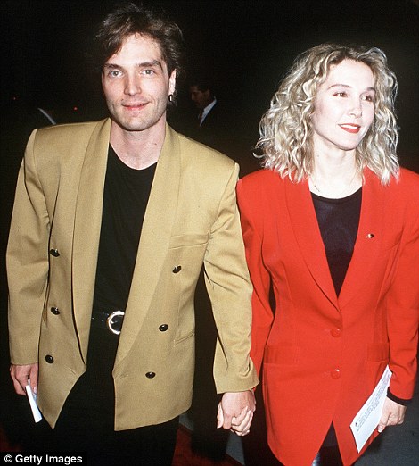 Split: Richard Marx and his actress wife Cynthia Rhodes (seen here in 1994) confirmed their divorce in April. They are now selling their marital home