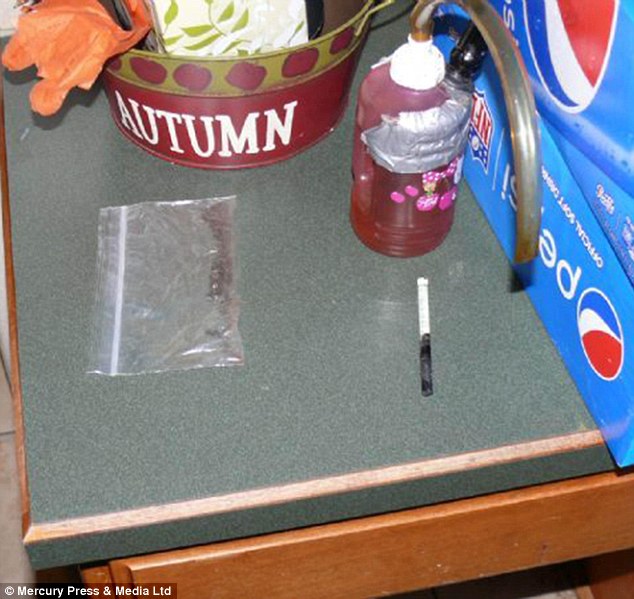 Drug paraphernalia was found at the house Jarrod and Erin Wells shared along with more than one ounce of heroin, several grams of methamphetamine and some hallucinogenic mushrooms