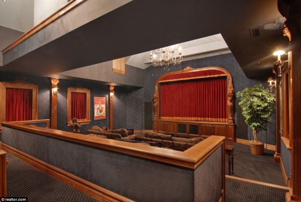 Entertainment: The house also has a home theater, complete with couches instead of chairs
