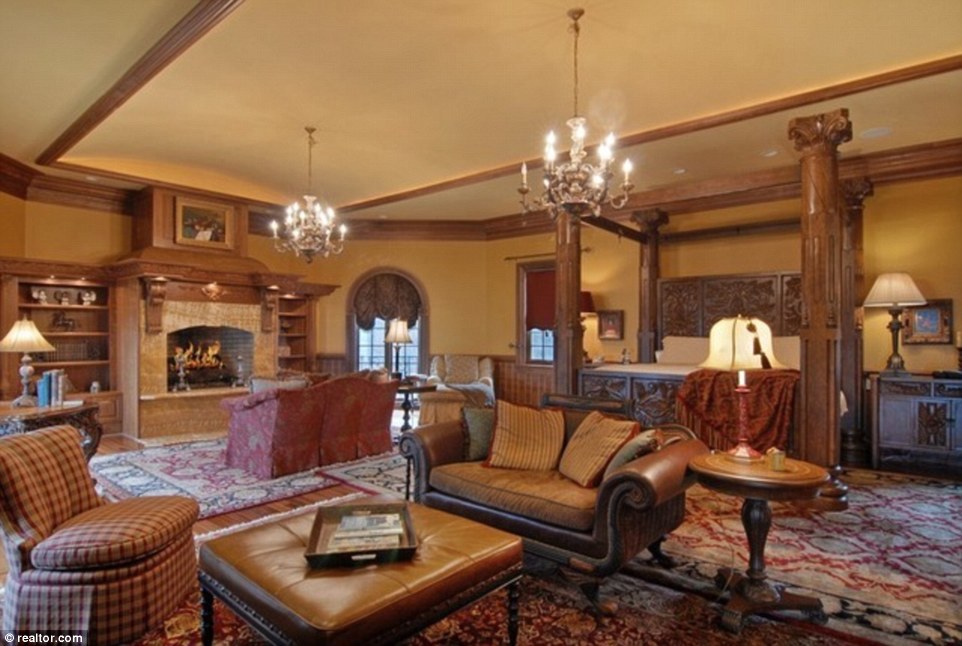 Now that's a bedroom: This guest room - one of nine bedrooms - comes with its own sitting room