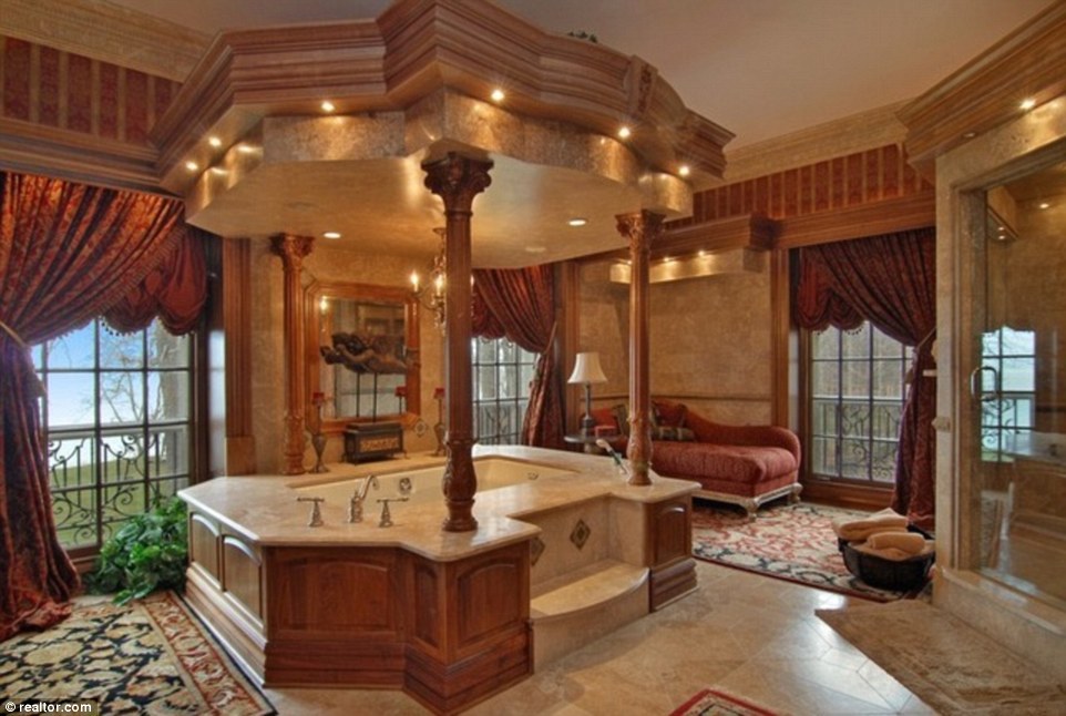 Grand: The master bathroom is particularly opulent