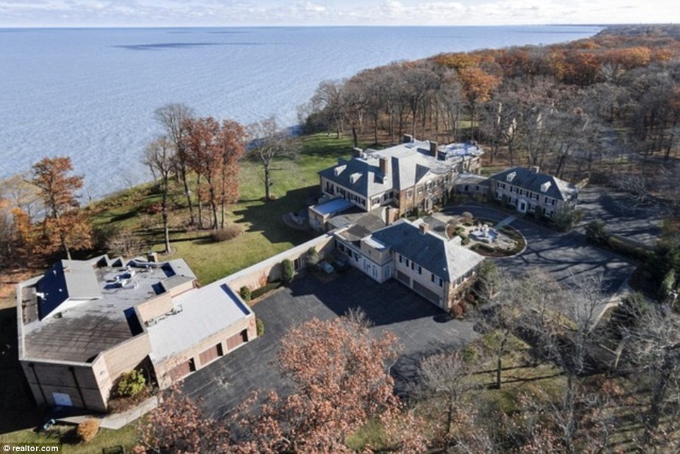Sprawling: The U-shaped estate (plus attached recording studio-left) measures at five acres and sits right on Lake Michigan