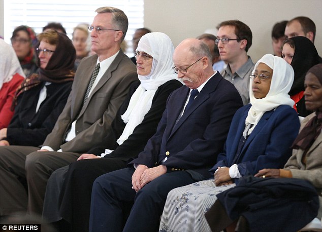 Congregation of the faithful: Hundreds of people of different faiths filed in the mosque at the Al-Huda Foundation in Fishers, Indiana, to honor Abdul-Rahman Kassig's legacy 