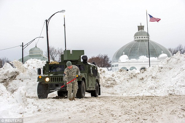 Response: But he added: 'Hopefully we need none of this. Hopefully this was just an elaborate exercise in logistics. We hope to get back to business on Monday.' Above, military officials remove snow in Buffalo